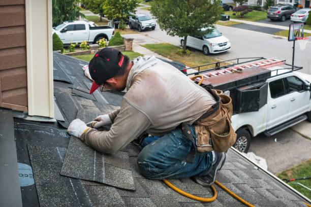Professional Roof Replacement technician working in Troy, ID